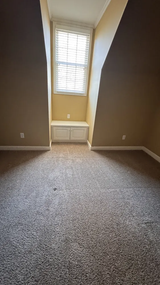 New carpet in a bedroom with a dormer window in Southbend, Guyton GA