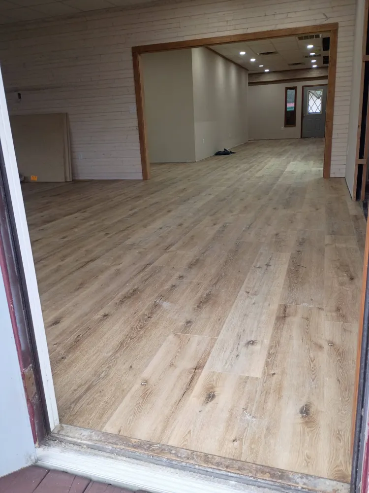 Commercial LVP flooring from the entry into an open space in downtown Guyton GA
