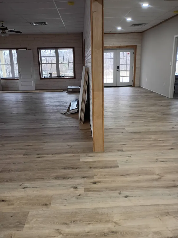 Continuous commercial LVP flooring across an open floor plan in downtown Guyton GA