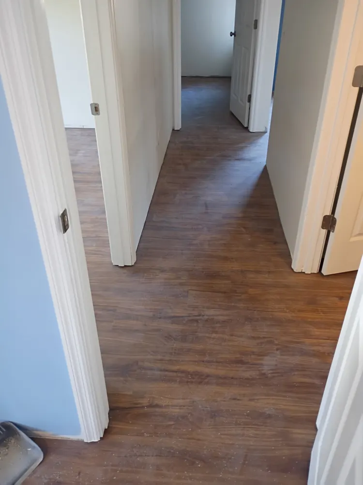 Luxury vinyl plank flooring through an upstairs hallway into the bedrooms in Southbend, Guyton GA