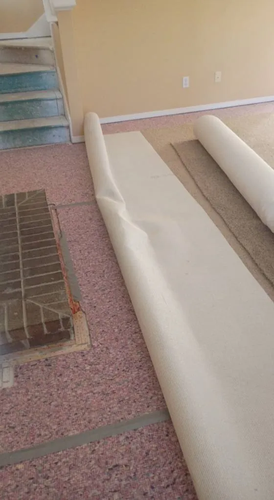 Old carpet pad being replaced before new carpet installation in Savannah Quarters, Pooler GA