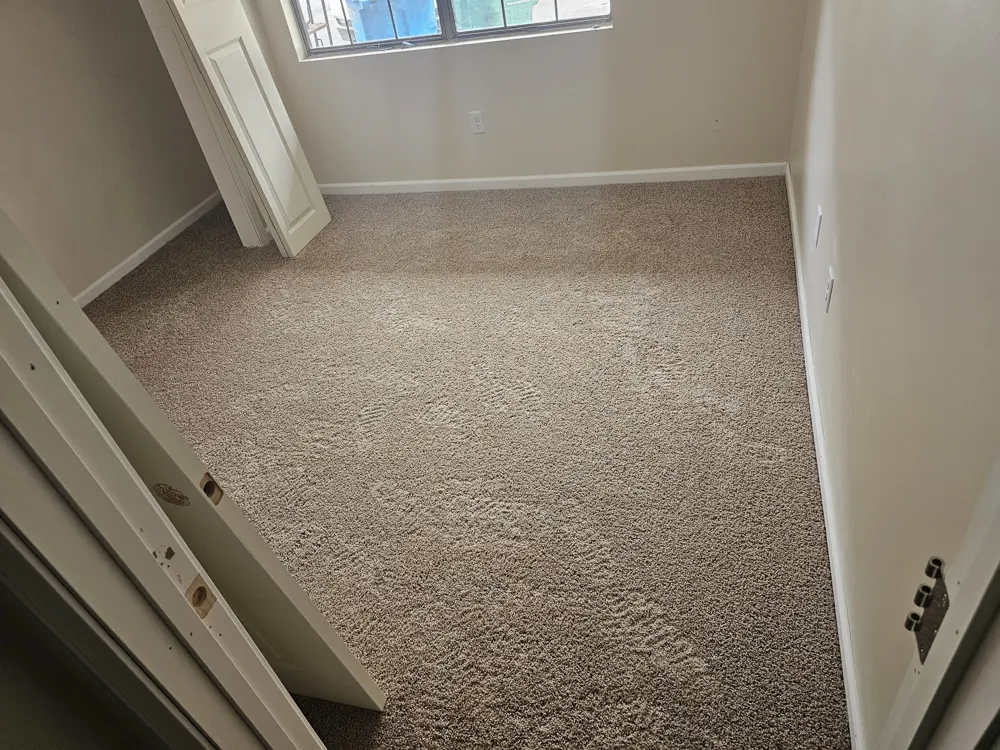 New carpet installed in a bedroom in Buckhead, Richmond Hill GA