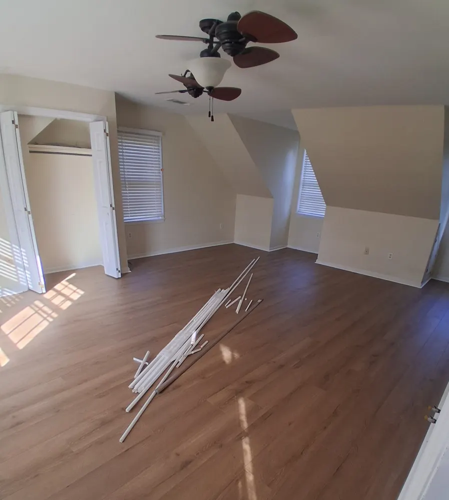 Luxury vinyl plank flooring in an upstairs bonus room in Dunham Marsh, Richmond Hill GA