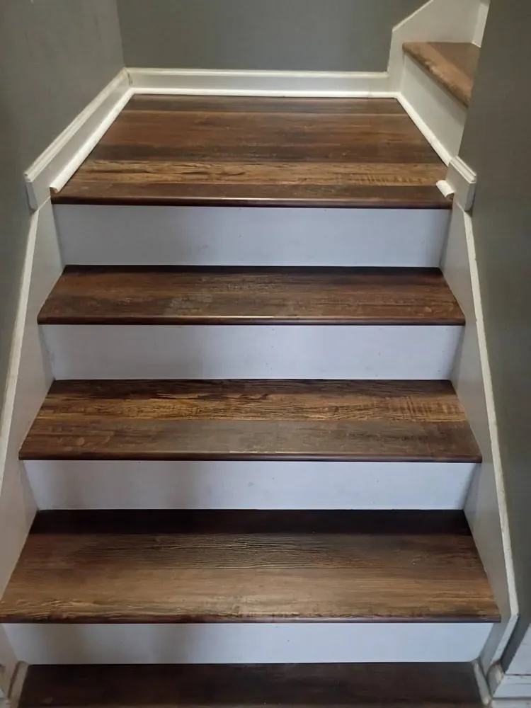 Luxury vinyl plank stair treads with finished nosing in Westwood Heights, Rincon GA