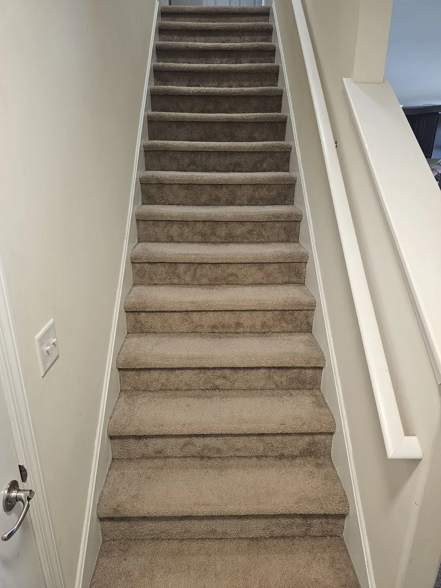 New carpet installed on a staircase in Henderson, Savannah GA