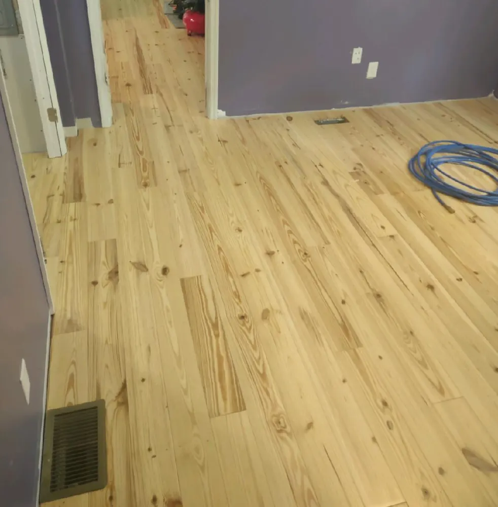 Pine hardwood flooring installation in a bedroom in Seines Landing, Springfield GA