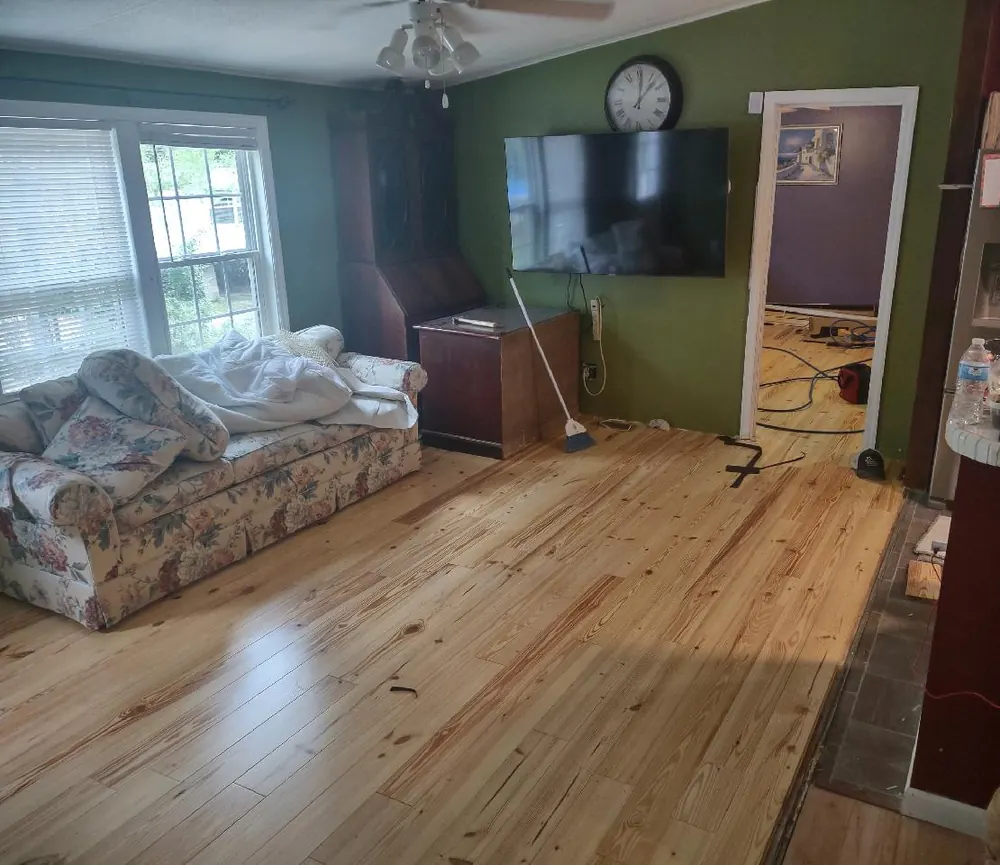 Solid pine hardwood flooring in a living room in Seines Landing, Springfield GA