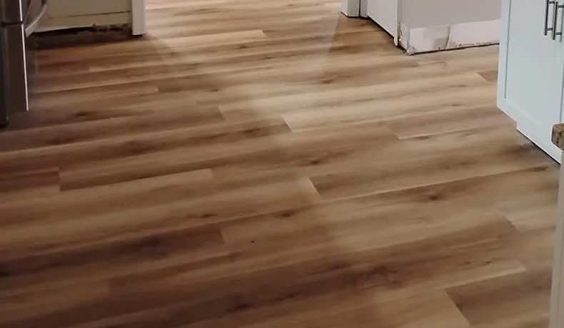 Wide-plank luxury vinyl plank flooring in a kitchen in Georgian Walk, Statesboro GA